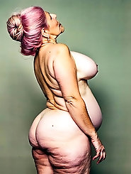 Pouting Lips and Pink Hair: A Hot Mature Women's Photo Shoot